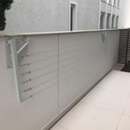 Varal Artesanal de Muro Retrátil